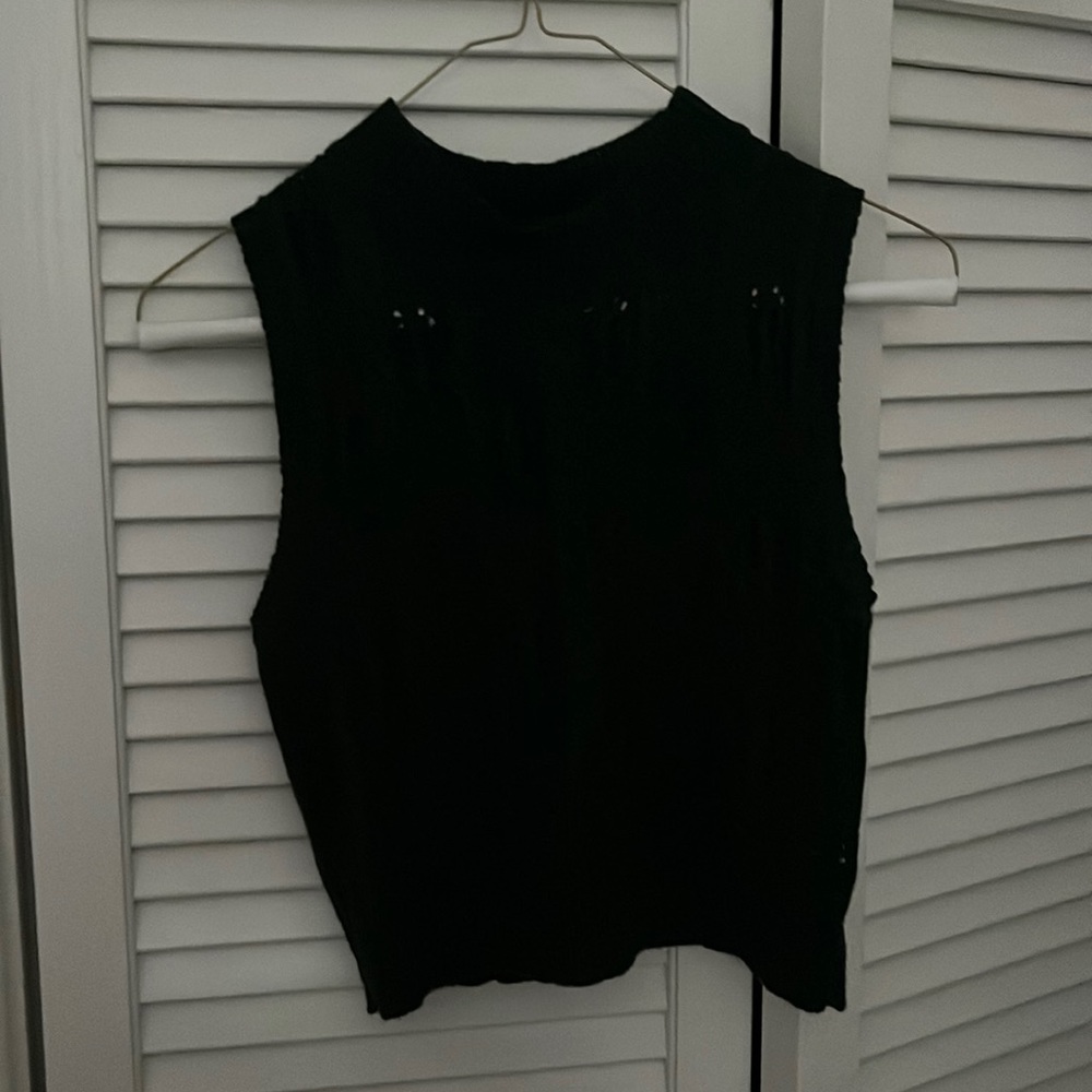 green sweater vest